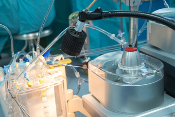 Heart lung machine for heart surgery in operating room. Roller pumps of heart lung machine for...