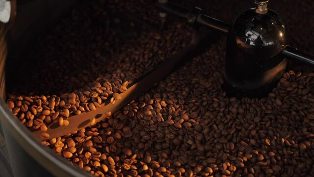 Close up of seeds of coffee. Fragrant coffee beans are roasted, hot aroma coffee and organic freshness, roast coffee industry cooked.