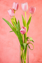 Bouquet of pink flowers in glass vase