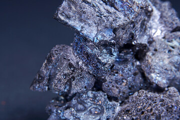 Macro shot of a Magnetite mineral specimen on a blurred background
