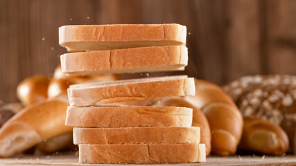 Falling sliced freshly baked toast bread.