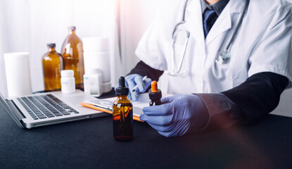 Concept fight against virus covid-19 corona virus, doctor or scientist in laboratory holding a syringe with liquid vaccines for children or older adults,Concept:diseases,medical care,science.