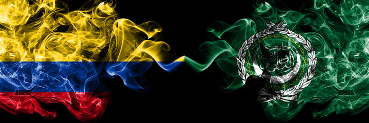 Colombia, Colombian vs Arab League smoky mystic flags placed side by side. Thick colored silky abstract smokes flags.
