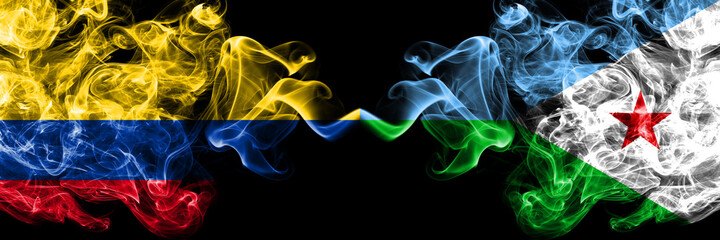 Colombia, Colombian vs Djibouti, Djiboutian smoky mystic flags placed side by side. Thick colored silky abstract smokes flags.