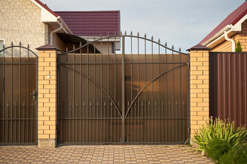 Metal forged gate for entering a private house.
