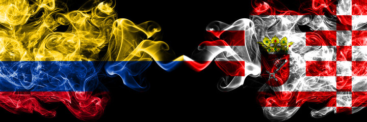 Colombia, Colombian vs Germany, German, Bremen smoky mystic flags placed side by side. Thick colored silky abstract smokes flags.