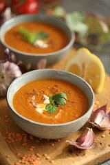 Red lentil and sweet potatoes soup in bowls