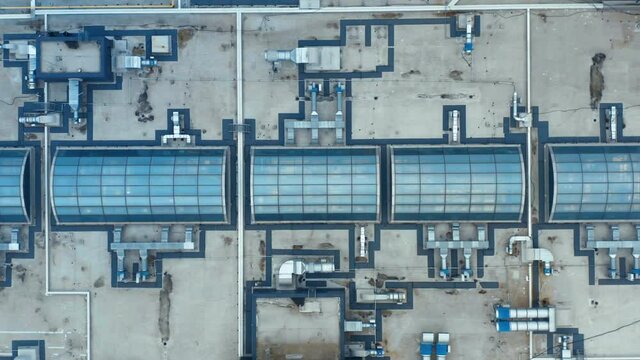 Heating, ventilation and air conditioning systems installed on a rooftop. Aerial top down view