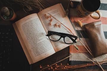 old book with glasses