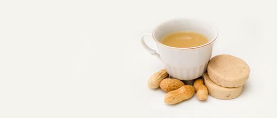 atole, marzipan and peanuts on a white background. with copy space