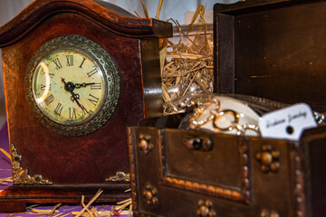 Clock with a treasure and jewerly