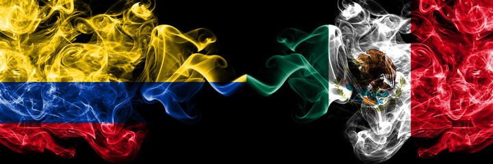 Colombia, Colombian vs Mexico, Mexican smoky mystic flags placed side by side. Thick colored silky abstract smokes flags.