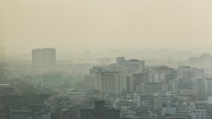 panoramic landscape view of Bangkok city and skyscape that showing smog and polluted air pollution from particle PM2.5