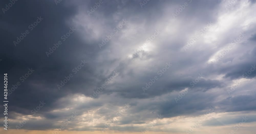 Wall mural dramatic sky with stormy gray clouds, hurricane rainy weather nature background. dark gray sky at se