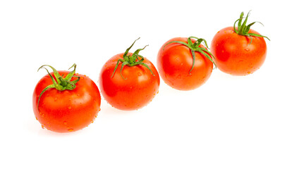 Four red wet tomatoes isolated on white background.