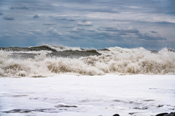 large and powerful sea waves during a storm