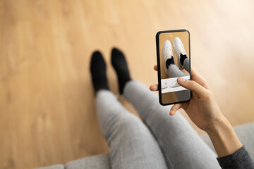 Woman Trying Virtual Sneakers In Online Shop