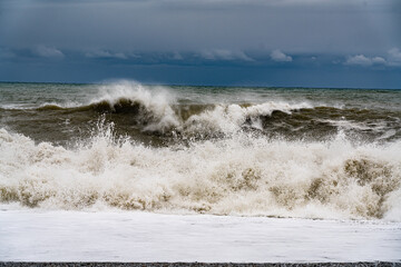 storm on the black sea against the backdrop of a cloudy sky