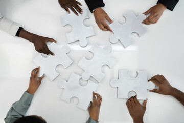 Overhead Teamwork Meeting Solving Jigsaw Puzzle