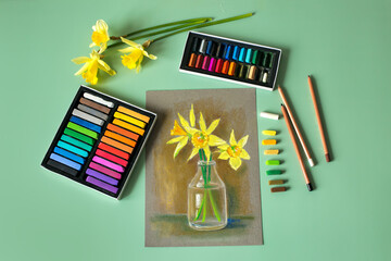 Soft pastel painting of daffodils, set of colored pastel and pencils