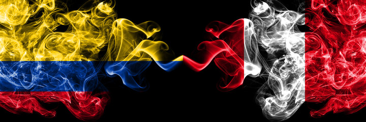 Colombia, Colombian vs Peru, Peruvian smoky mystic flags placed side by side. Thick colored silky abstract smokes flags.