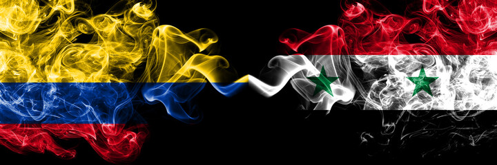 Colombia, Colombian vs Syria, Syrian smoky mystic flags placed side by side. Thick colored silky abstract smokes flags.