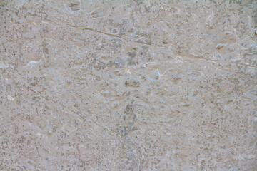 Abstract concrete background - in the form of a old rough scuffed wall, closeup