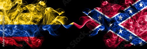 Colombia, Colombian vs United States of America, America, US, USA, American, Confederate Navy Jack smoky mystic flags placed side by side. Thick colored silky abstract smokes flags.