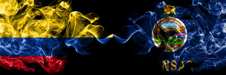 Colombia, Colombian vs United States of America, America, US, USA, American, Kansas smoky mystic flags placed side by side. Thick colored silky abstract smokes flags.