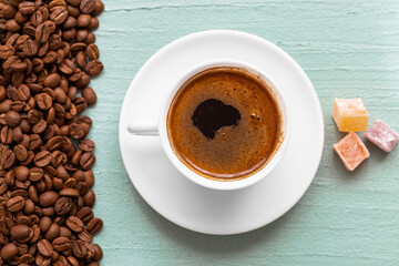 Coffee grains and beautifully baked coffee. Turkish coffee.