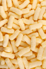 Background and texture of heap of corn sticks. View from above.