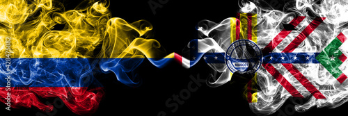 Colombia, Colombian vs United States of America, America, US, USA, American, Tampa, Florida smoky mystic flags placed side by side. Thick colored silky abstract smokes flags.