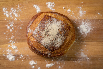 Italian bread with wheat flour. Wooden base and top view.