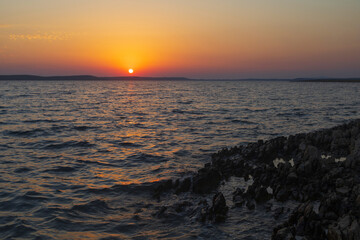 Sunset in Adriatic sea in mainland Dalmatia, Croatia