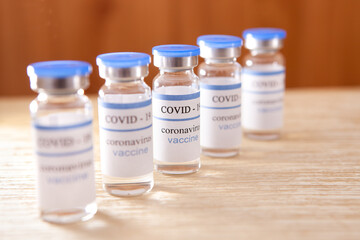 Vaccination coronavirus concept, ampules against pandemic