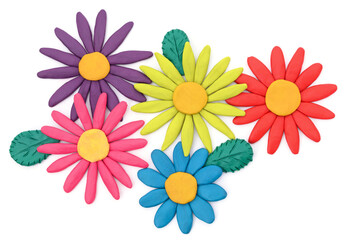 Plasticine flowers with leaves.