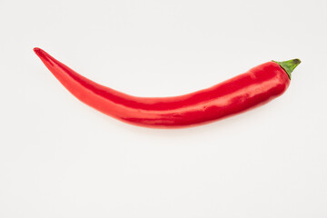 spicy red chili pepper on white background