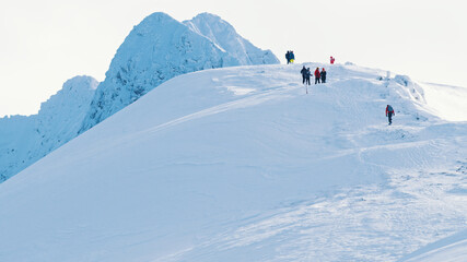 Fototapeta na wymiar Ski Slopes On A Bright Sunny Day. Clear Blue Sky Winter mountain landscape 