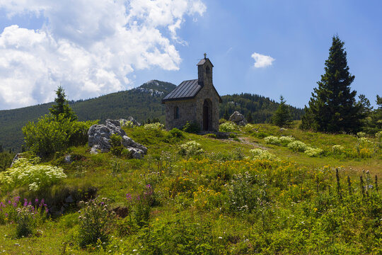 Small chapel in the middle of the mountain meadow in Northern Velebit National park, Croatia