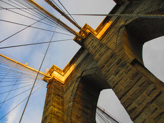 Detail of the Brooklyn Bridge at sunset
