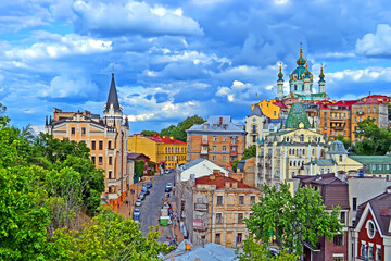Andreevsky street old town (famous Andriyivskyy Descent aka Andrew's Descent). Saint Andrew's Church and Tower of the King Richard in Kiev, Ukraine.. Ukraine sightseeing diversity