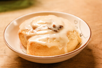 Delicious hot cinnamon roll with icing