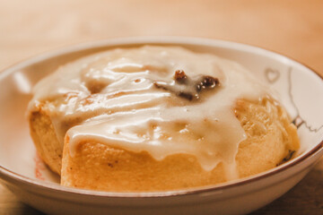 Delicious hot cinnamon roll with icing