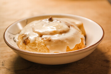 Delicious hot cinnamon roll with icing