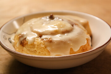 Delicious hot cinnamon roll with icing