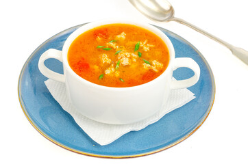 Thick homemade vegetable soup with rice, pumpkin and tomatoes