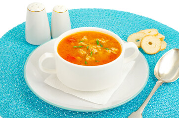 Thick homemade vegetable soup with rice, pumpkin and tomatoes