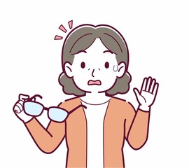 メガネを取った人