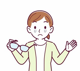 メガネを取った人