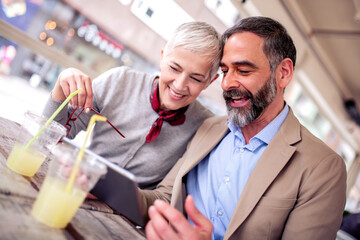 Senior couple in cafe